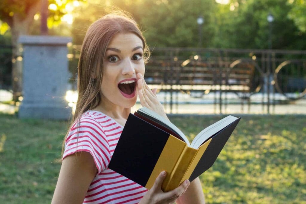 girl enjoys free library card discounts from her local library