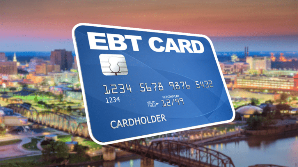 EBT card over blurred image of Shreeveport represents Louisiana EBT discounts