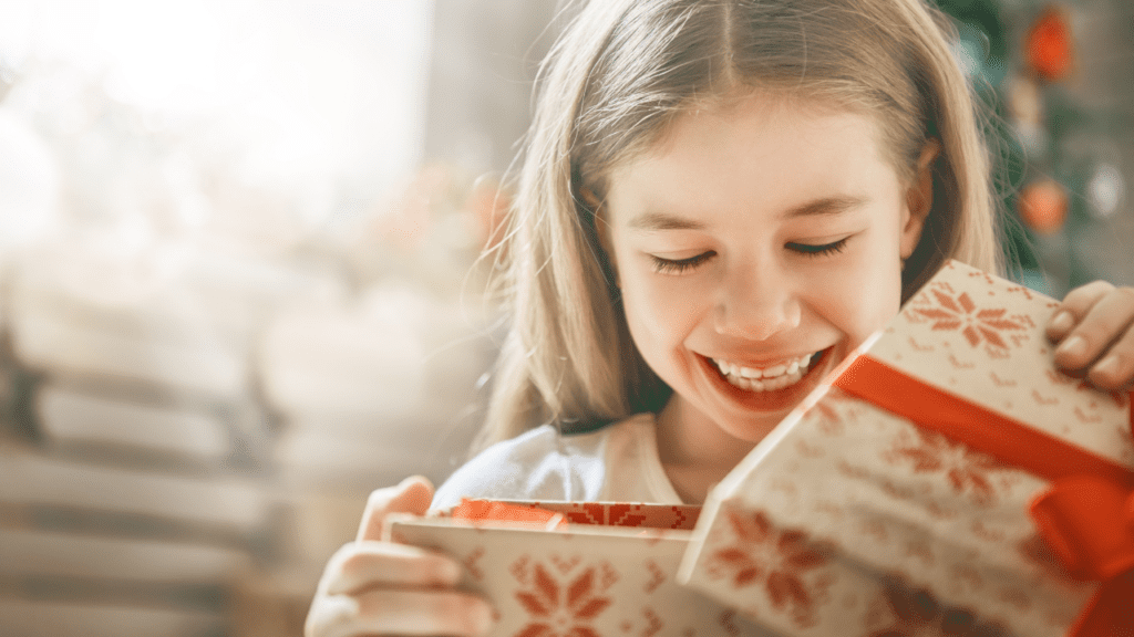 girl enjoys Christmas assistance in Tennessee after parents apply for free Christmas gifts