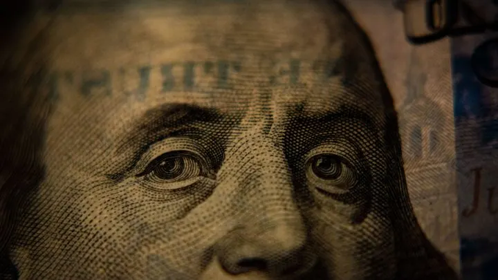 close up image of george washington's face on the dollar bill in artcile about how do i know if my ebt card has cash benefits?