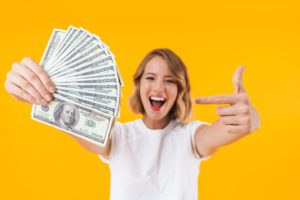 woman happy she learned how to get cash now