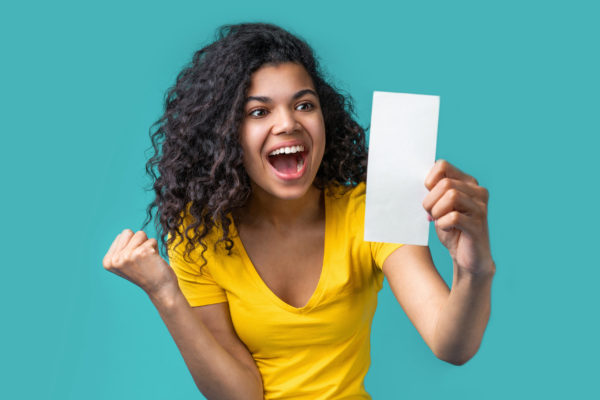 woman is happy she found real coupons