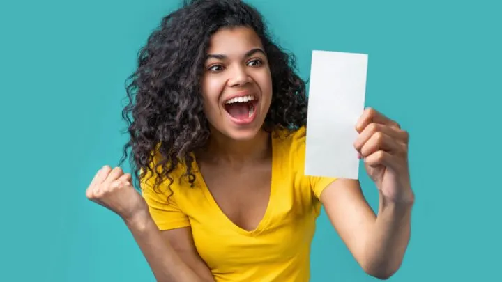 woman is happy she found real coupons