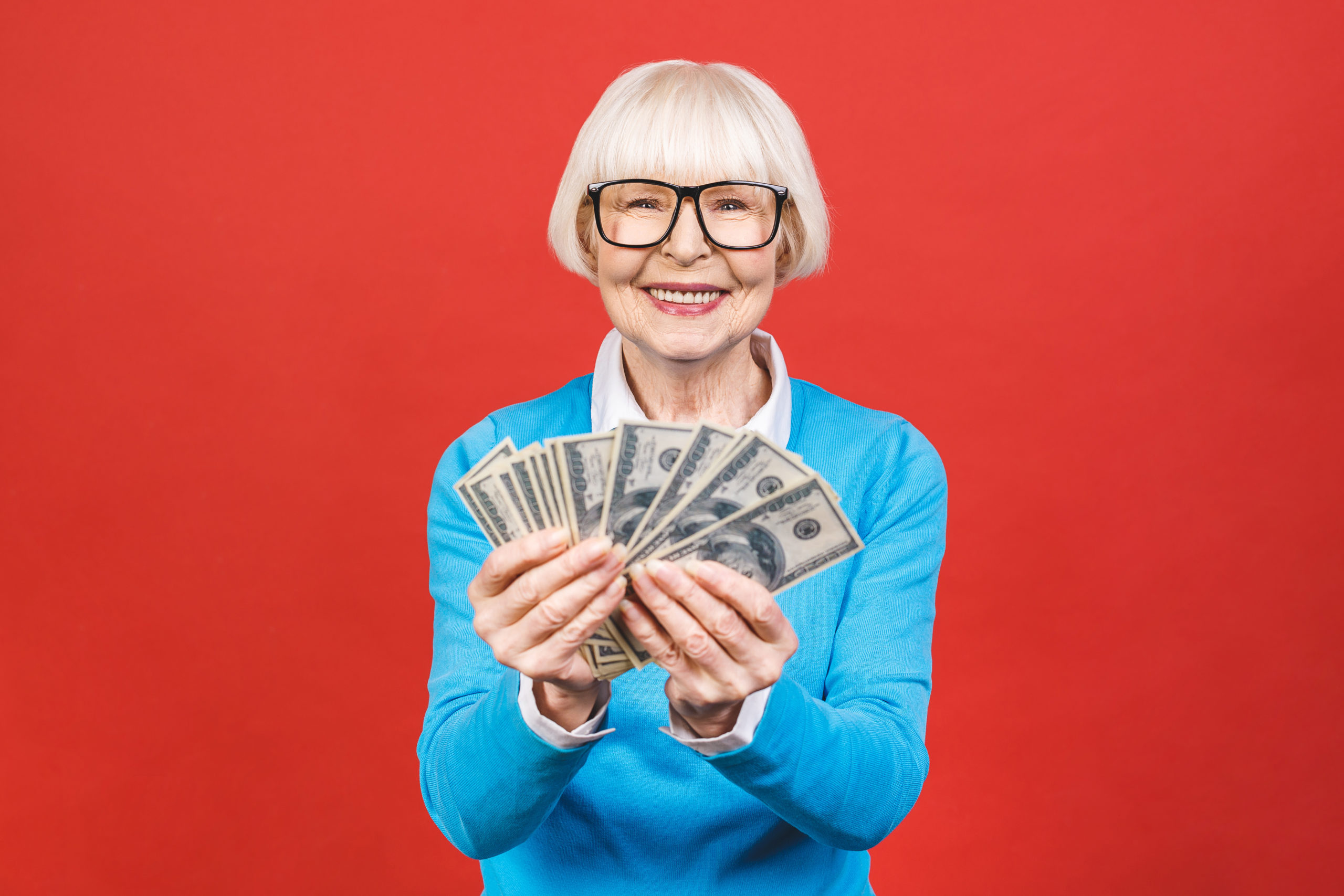 woman excited about stimulus check for seniors