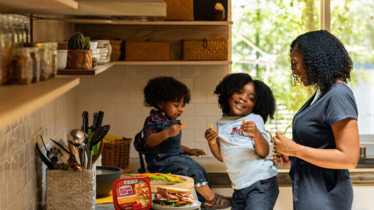 mother and two children in their kitchen in article on Colorado Works