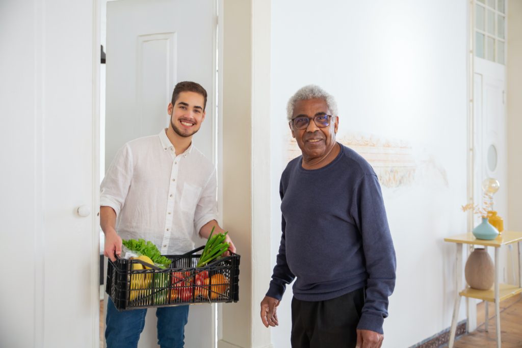 dementia caregiver support man helping with food