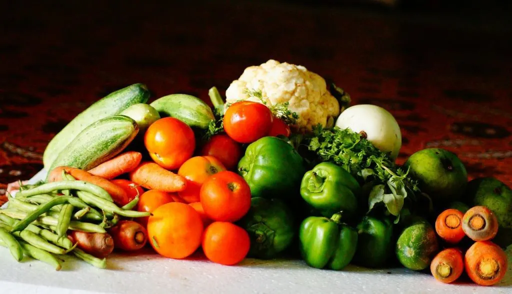 pile of vegetables in article on what is general relief assistance