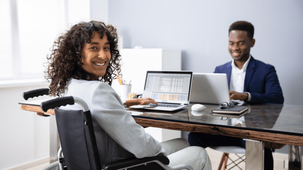 woman receives help applying for private grants for people with disabilities