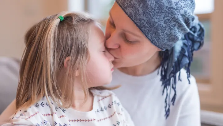 single mom gets grants from infinite strength for breast cancer diagnosis