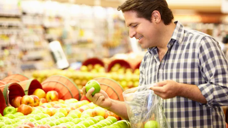 man shops with EBT while remembering the five things EBT users should do monthly