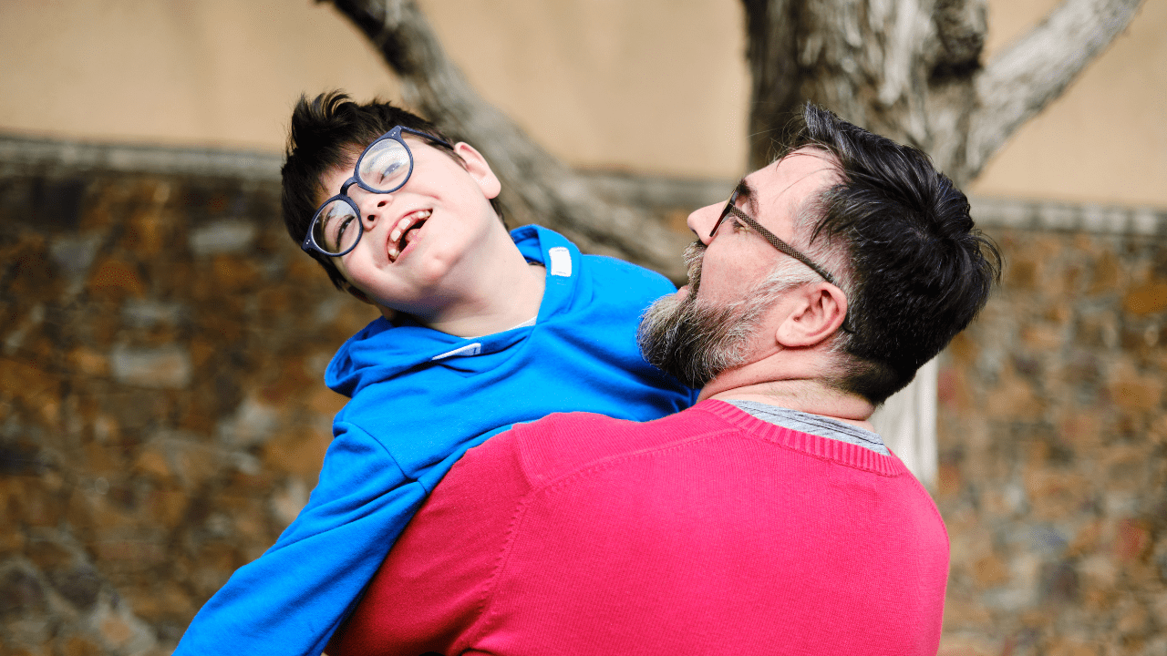 family celebrates after receiving financial help for special needs children